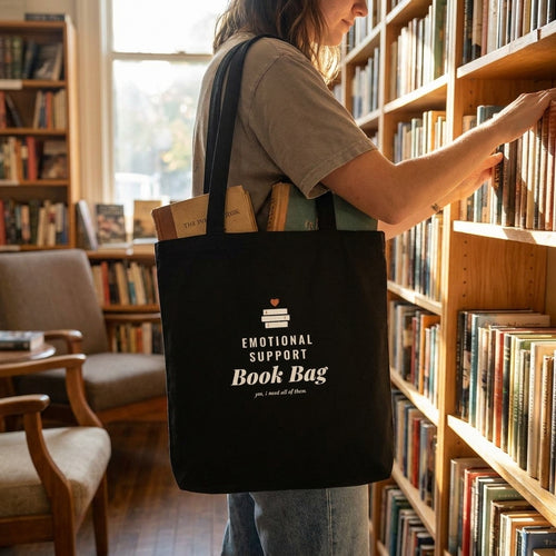Emotional Support Book Bag — tote bag carried by a reader