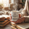 Enemies to Lovers to Dragon Riders — mug in a reader’s hands
