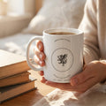 Riders War College — mug in a reader’s hands