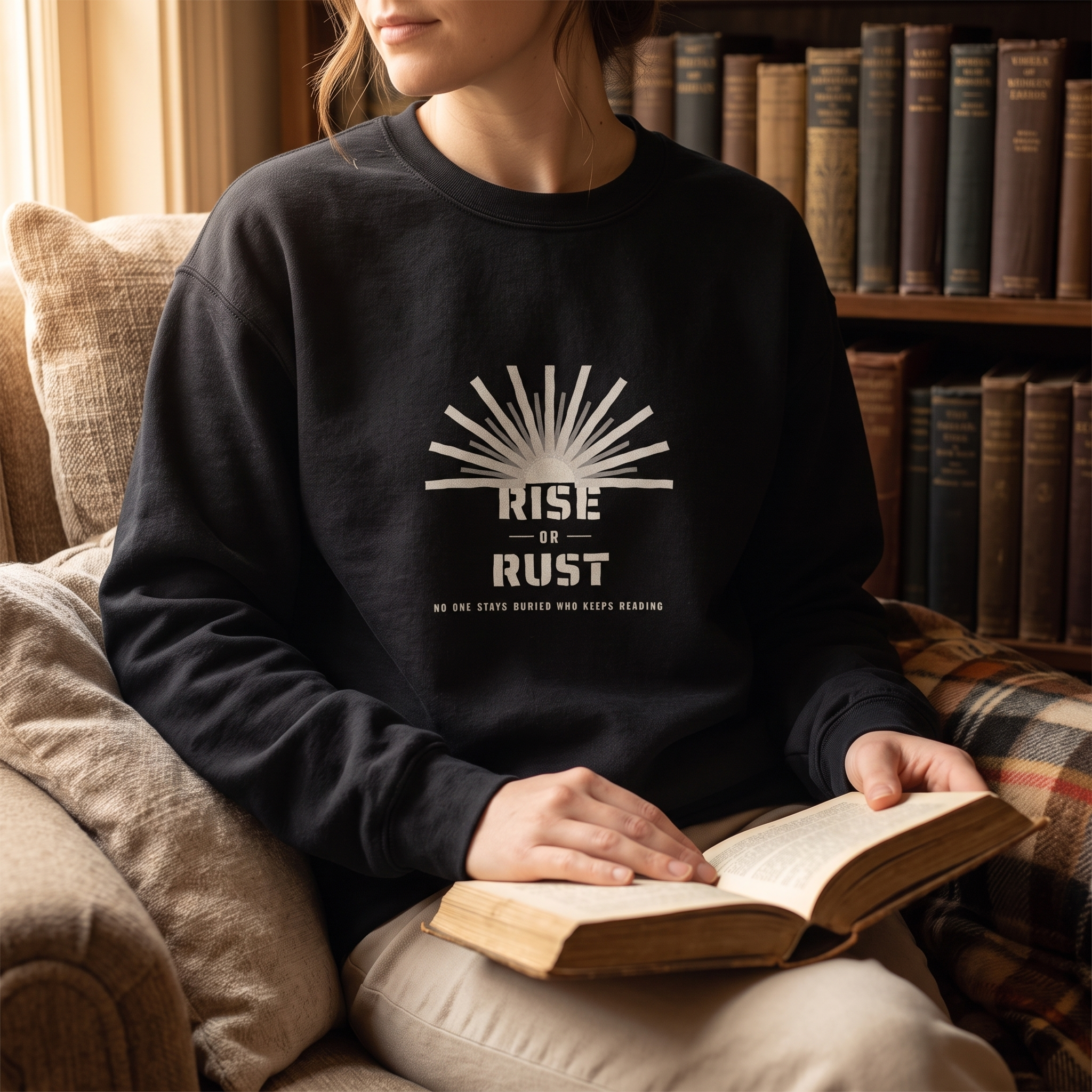 Rise or Rust — the morning breaks for readers who reach — sweatshirt worn by a reader