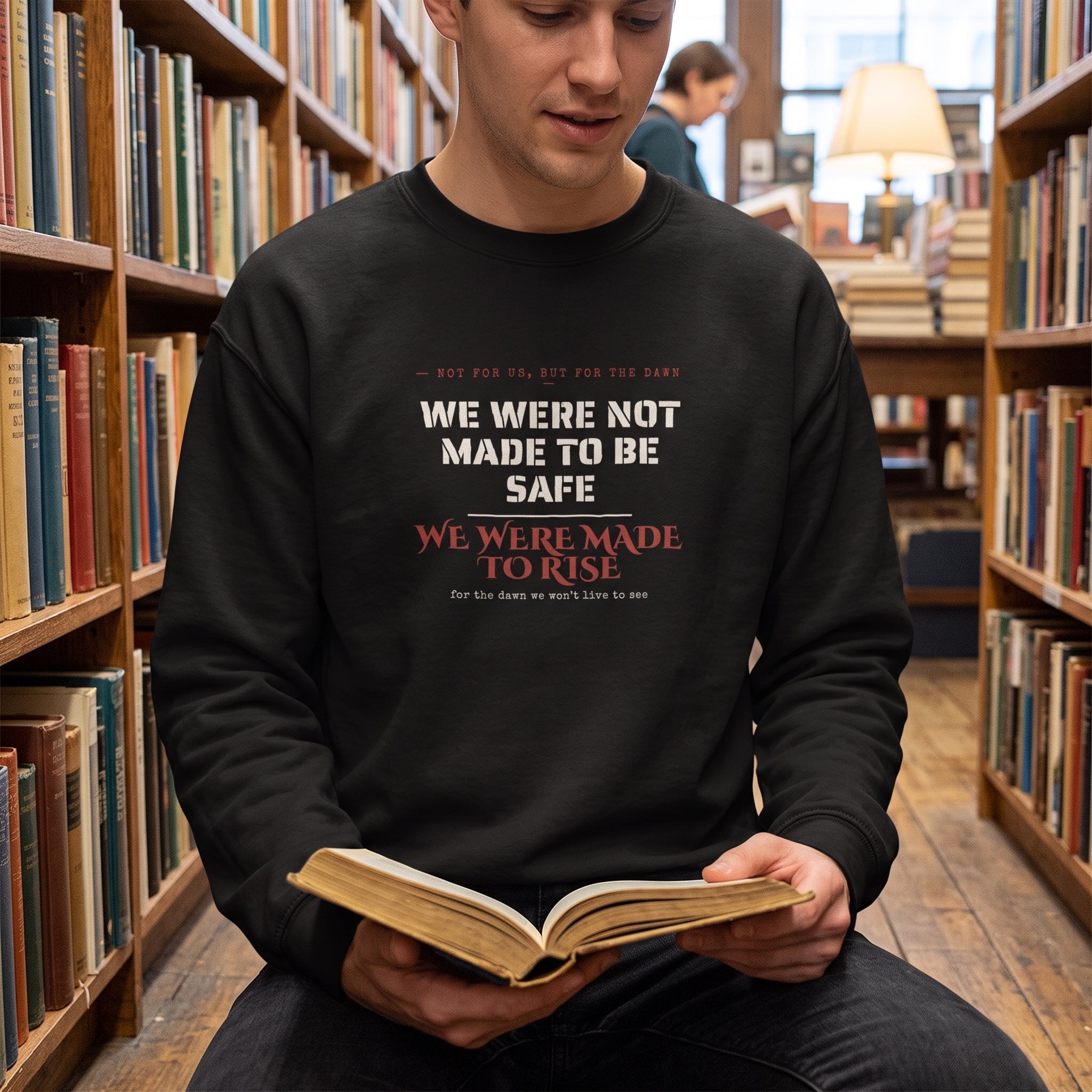 We Were Not Made to Be Safe — We Were Made to Rise — sweatshirt worn by a reader