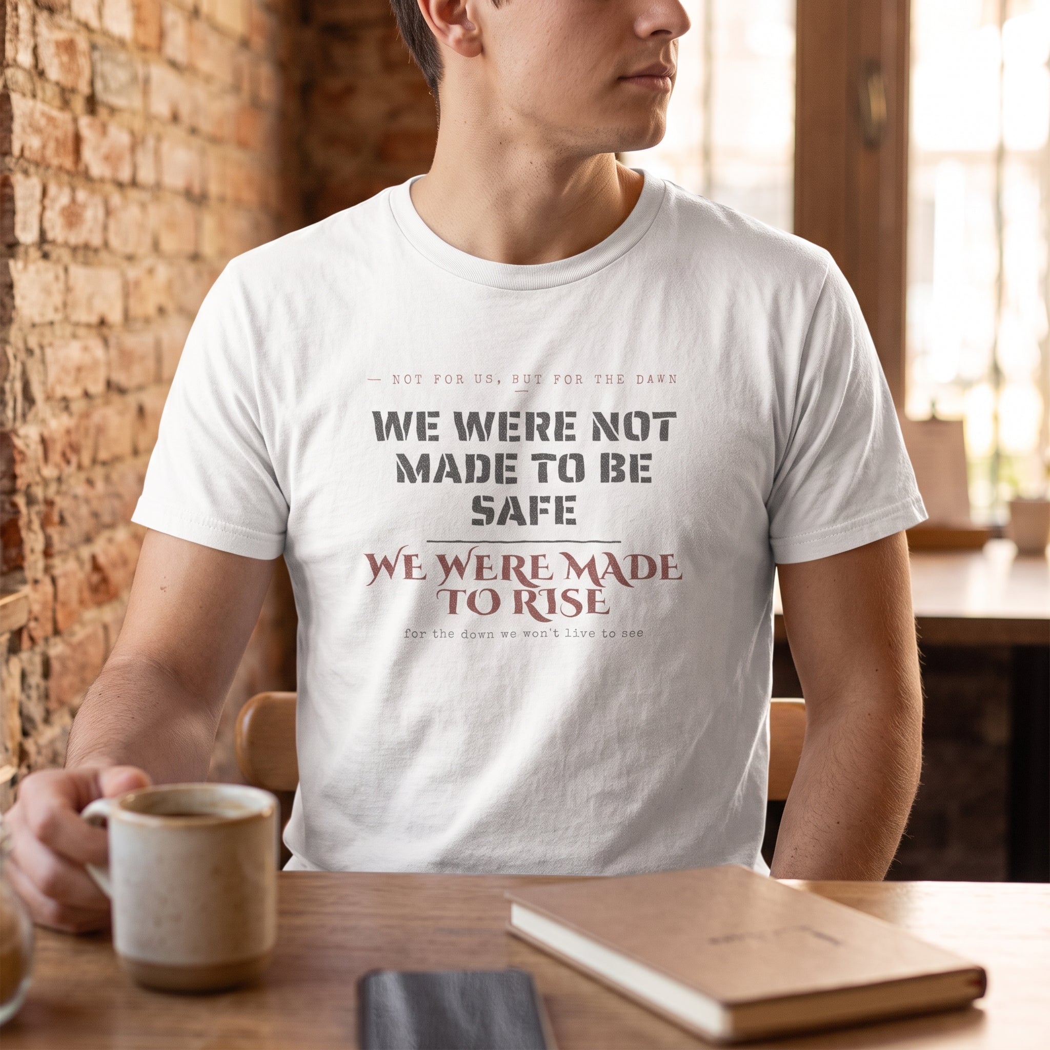 We Were Not Made to Be Safe — We Were Made to Rise — t-shirt worn by a reader