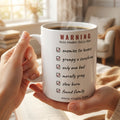 Falls For The Following Tropes — mug in a reader’s hands