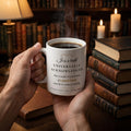 It is a truth universally acknowledged that a reader in possession of a good book must be in want of nothing — mug in a reader’s hands