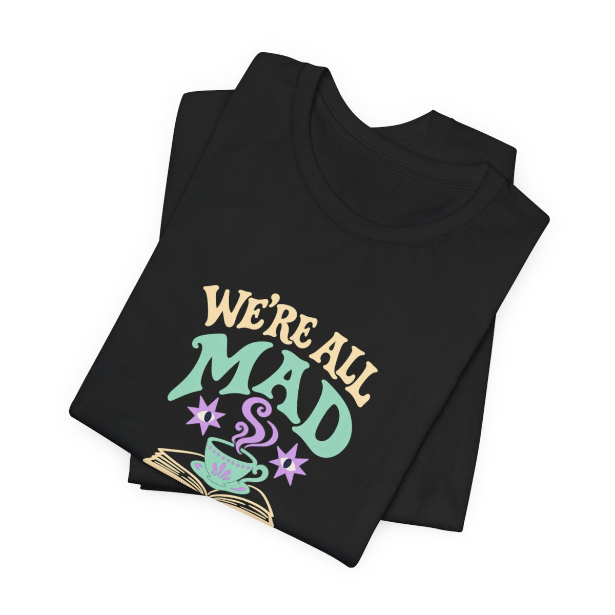 We’re All Mad Here T-Shirt in Black, folded supplier mockup